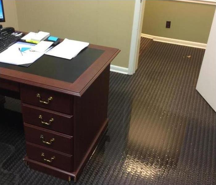 flooded office before SERVPRO 